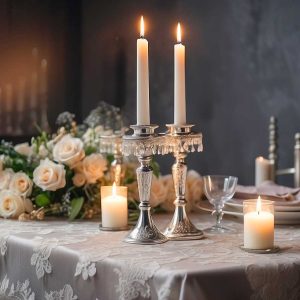 Default_Two_silver_candlesticks_with_lighted_candles_stand_on_3
